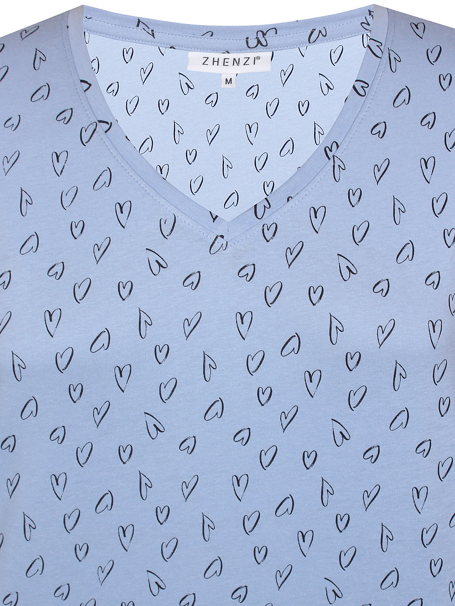 Ljusblå t-shirt i ekologisk bomull med svarta hjärtan fra Zhenzi