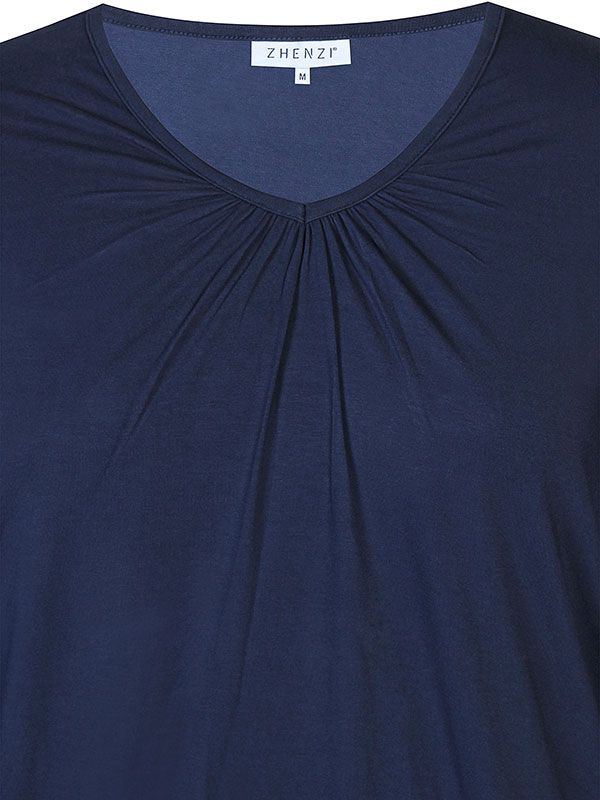 GIRO - Marinblå blus med resårkant fra Zhenzi