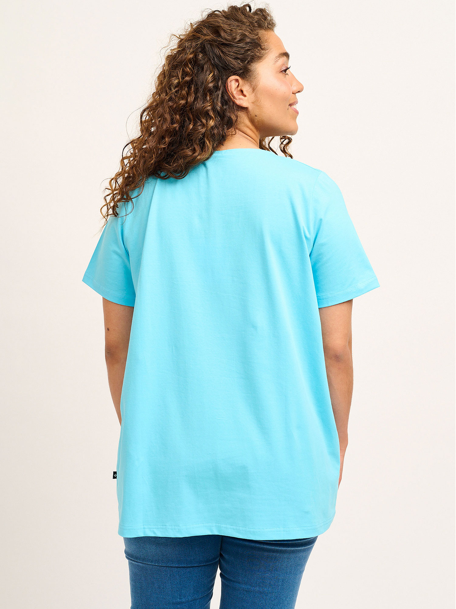 Ljusblå t-shirt i bomullsjersey med stort tryck fra Adia