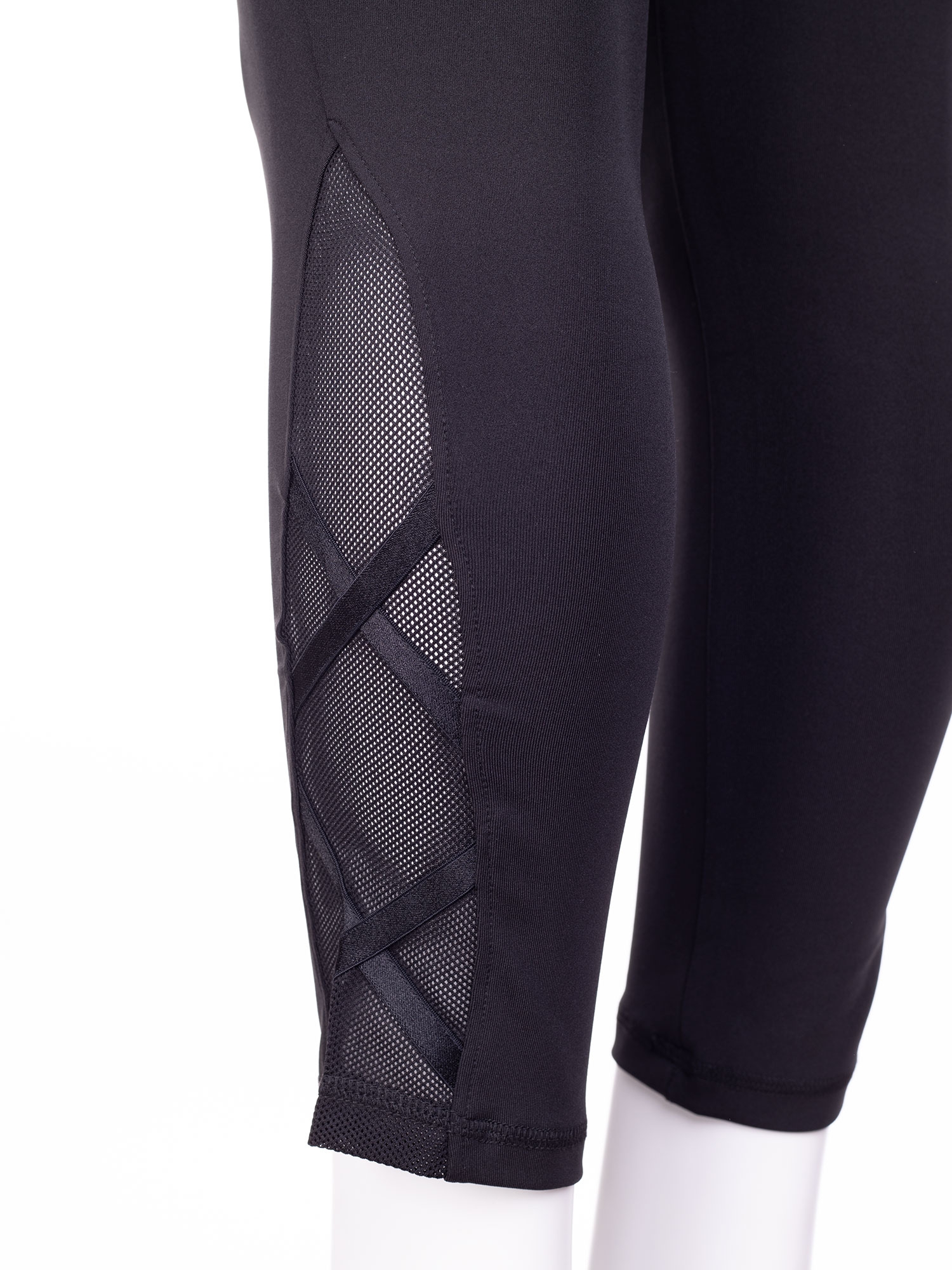 Svarta capri tights med mesh detalj fra Aprico Sport